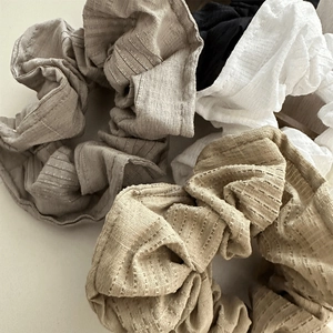 Elegant multi-color ruched fabric scrunchies in neutral tones for sweet summer hairstyling