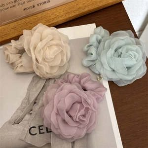 Elegant chiffon rose hair scrunchies in cream, blue and mauve colors for ponytails