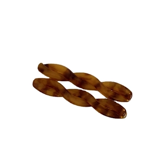 Vintage tortoiseshell acetate twisted hair clips for women in elegant brown amber pattern