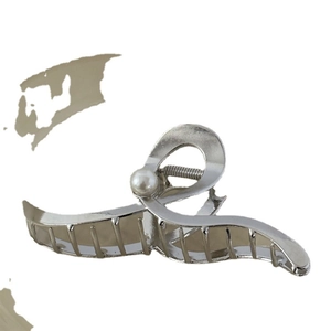 Elegant wave-shaped silver alloy hair claw clip with a lustrous white pearl for women