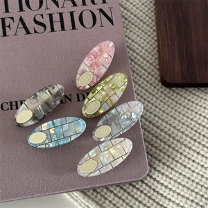 Set of 6 colorful checkered acetate hair clips with golden oval details for women