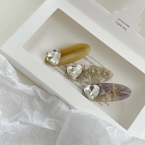 Set of 3 acetate hair clips with heart rhinestones and colorful marble patterns