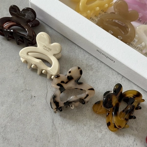 Colorful acetate rabbit hair claws with elegant tortoise shell and marble patterns