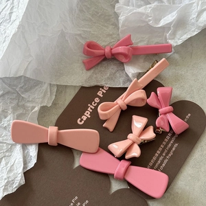 Lot de barrettes à cheveux roses en résine avec nœuds et finition brillante