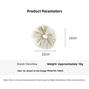Détails du chouchou en tissu crème avec annotations de taille et mesures techniques