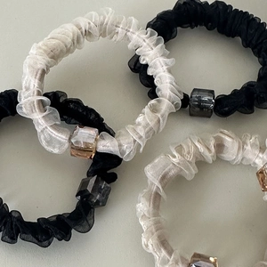 Set of four chiffon scrunchies in black and beige with transparent cube beads