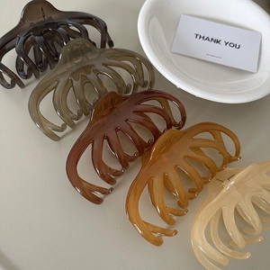 Set of five large matte flower hair claws in earth tones for thick hair styling