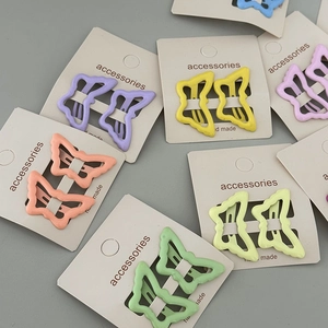 Matte butterfly hair clips in Morandi colors for women, minimalist hollow metal design