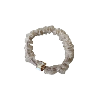 Elegant beige organza scrunchie featuring a champagne square crystal bead accessory