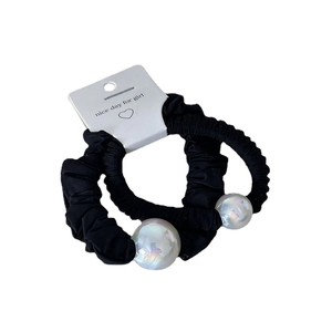 Set of 2 elegant black scrunchies with iridescent large pearls on white card