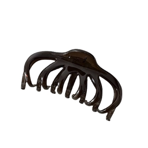 Translucent dark brown large hair claw clip with octopus design for thick hair styling