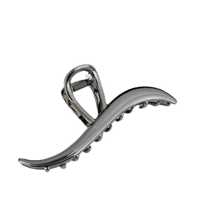 Large wave metal claw clip for women in gunmetal gray with a glossy minimalist finish