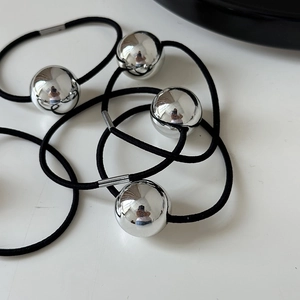 Set of minimalist black high-elastic hair ties with polished silver mirror spheres