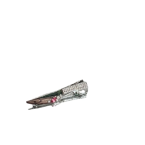 Silver liquid metal hair clip with pink and clear rhinestones in starburst pattern