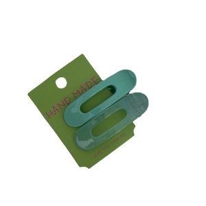 Lot de deux barrettes à cheveux ovales vert crème pour filles sur carte