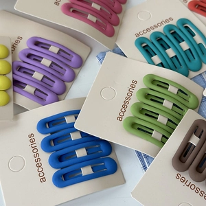 Matte oval BB hair clips set in Morandi cream colors on an accessories card
