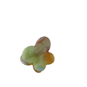 Floral gradient acetate hair claw clip with colorful marble pattern and gold lettering