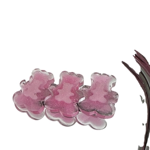 Barrettes à cheveux ours roses translucides pailletées style Y2K sur fond blanc