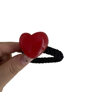 Red jelly heart hair tie with black elastic rope and gold France lettering