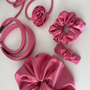 Pink satin hair accessory set with headband, scrunchies, and rose ribbon ties