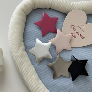 Set of 5 colorful Y2K star hair clips in vibrant colors with matte and glossy finish