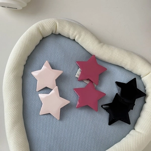 Set of six cute Y2K star-shaped hair clips in pink, magenta, and black colors