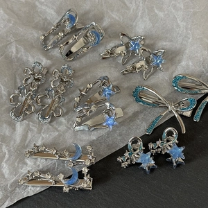 Set de barrettes Y2K argentées et bleues avec motifs étoiles lunes et papillons