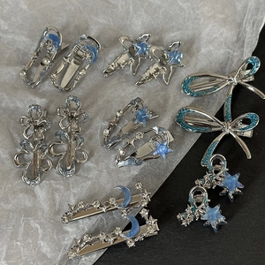 Set de barrettes Y2K bleu argent avec motifs étoile lune et fleurs ajourées