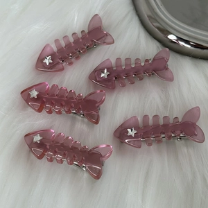 Pink Y2K fishbone hair clips set of 5 with silver star detail on plush background
