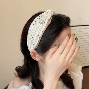French retro cream polka dot headband with knot detail, pearls and rhinestones decoration