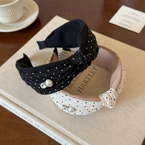 Polka dot wide headband with cross knot, faux pearls and crystals detail view