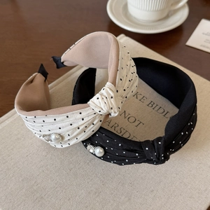 Polka dot knotted headbands with elegant pearl and rhinestone details in a French retro style