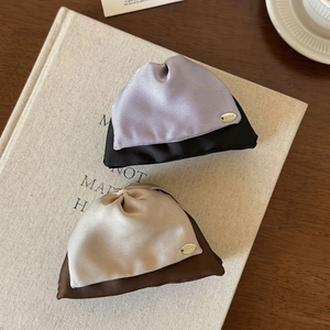 Elegant fan-shaped satin hair claw clip with contrast colors and golden Lucky metal label