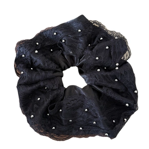 Elegant black lace scrunchie with beaded pearls and ruffled edge for hair styling