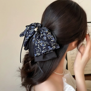 Blue floral ribbon bow hair claw clip with pearl accent for elegant women's hairstyles