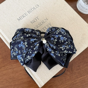 Elegant blue floral bow hair claw clip with black satin ribbons and pearl pendant