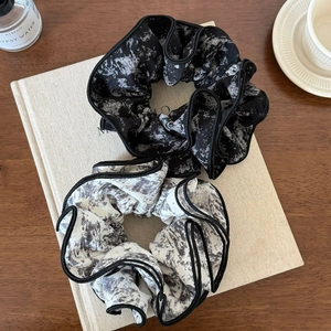 French retro ink painting scrunchies in black and beige marble pattern on book