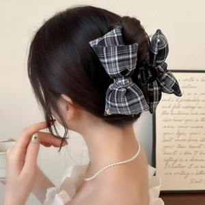 Eleganter schwarz-weiß karierter Haarklammer mit Schleife für Damen-Frisuren