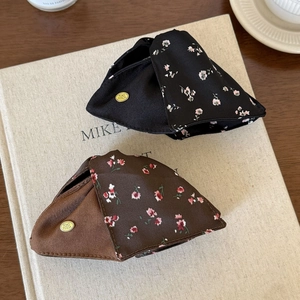 French floral fabric hair claw clip with satin finish and golden logo detail
