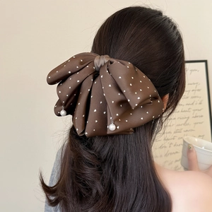 Brown satin bow hair clip with white heart patterns and elegant pearl drop pendants