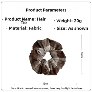 Brown plaid fabric scrunchie detail with 15cm diameter and 20g lightweight design