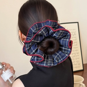 Plaid scrunchie with red trim for bun and ponytail, academic preppy style hair accessory