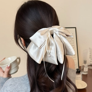 Elegant champagne satin layered bow hair clip with crystal pendant for women's hairstyle