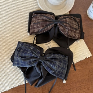 Plaid bow hair claws in brown and blue with pearl charms for a vintage autumn look