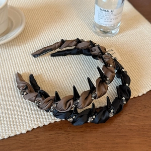 Set di cerchietti intrecciati con cristalli marroni e neri e denti antiscivolo eleganti