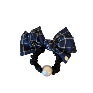 Elegant navy blue plaid bow hair scrunchie with large white pearl and gold tag detail