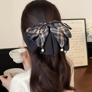 Elegant black double-layered bow hair claw with plaid ribbon and pearl pendants