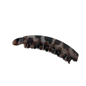 Banana hair clip with leopard print pattern and inner teeth for high ponytail styling