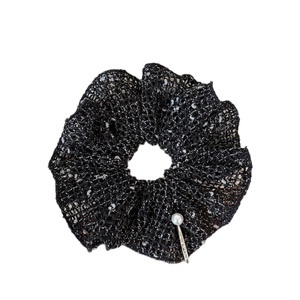 Elegant hollow knit scrunchie in black with pearl charm and white dot texture