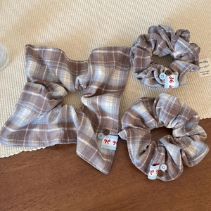 Three-piece checkered fabric hair scrunchies set with vintage buttons and tags
